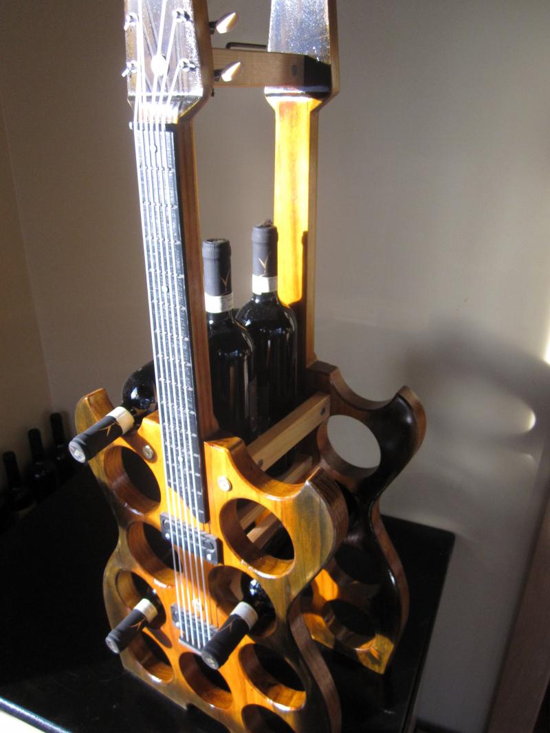 13 bottle guitar wine rack looks so real, you might try to play it!